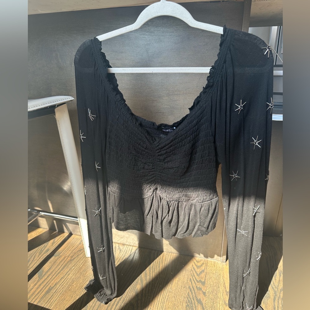 Black long sleeve urban outfitters top with metal stars